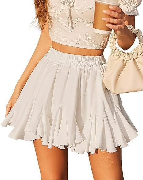 A-line high waist pleated mini skirt with elastic waist in white for adults, suitable for running, cycling, and dancing.