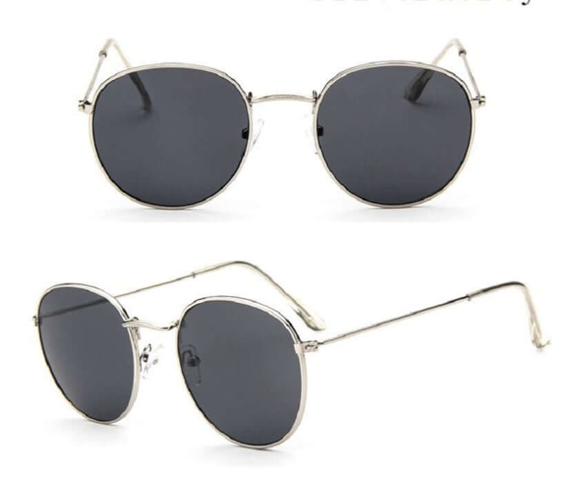 Women retro sunglasses with silver metal frame and grey lenses.