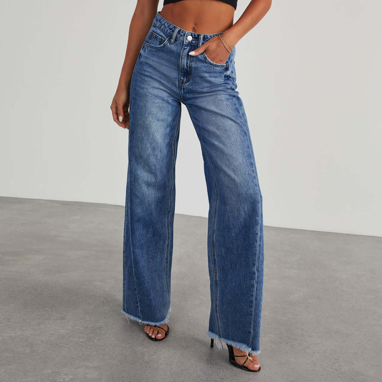 Women's loose casual straight-leg wide leg denim mop pants in blue.