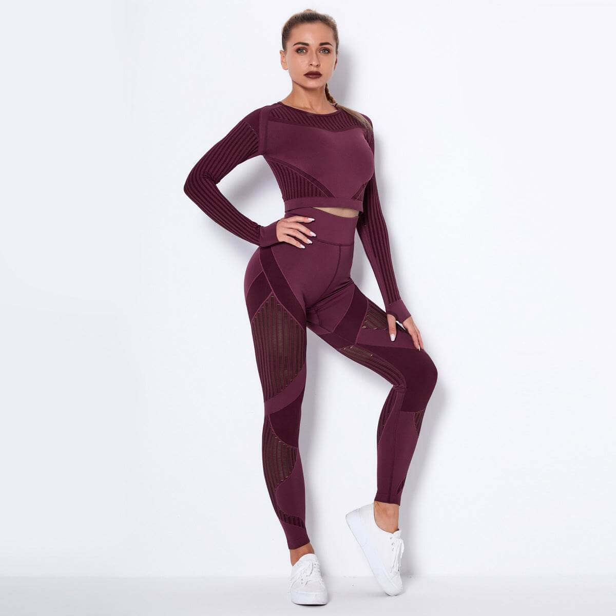 Woman wearing a seamless knitted absorbent yoga long-sleeved suit with stripe pattern.