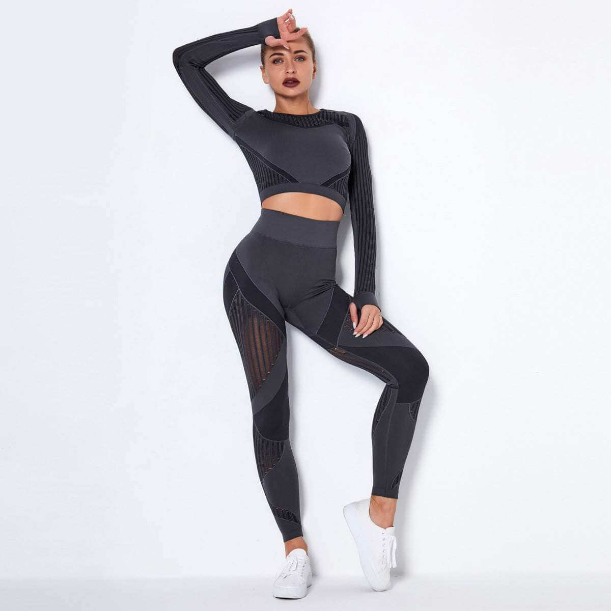 Seamless knitted absorbent yoga long-sleeved suit for women featuring a stripe pattern.