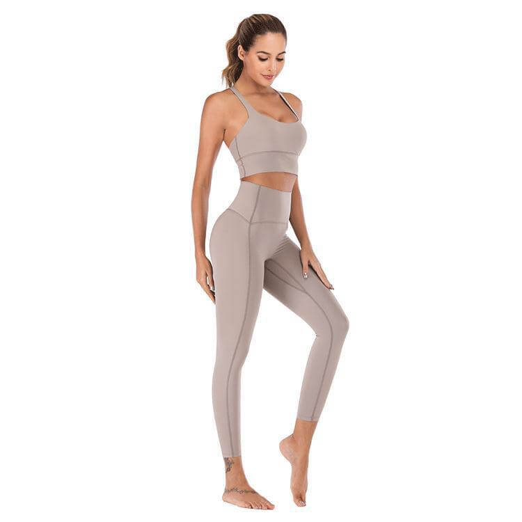 Gray yoga solid color sports underwear suit with fitness yoga pants, made from a comfortable cotton blend, designed for breathability.