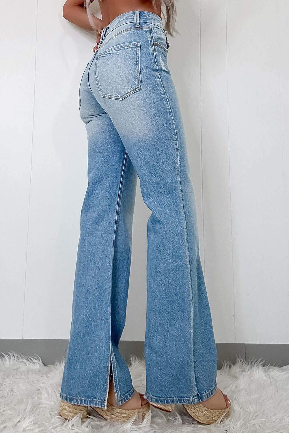 Myosotis Ripped High Rise Slit Jeans in light wash, featuring a flattering silhouette and vintage charm.