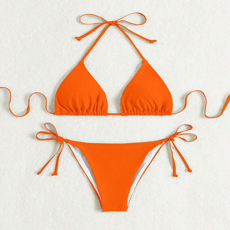 Orange tied halter bikini swimsuit with triangle top and briefs.