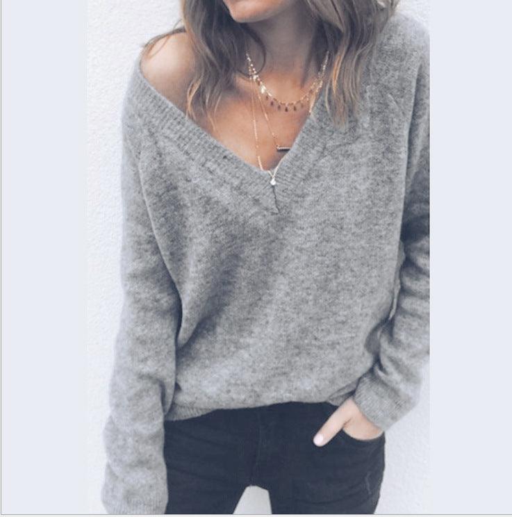 Gray V-neck long sleeve loose sweater for women in solid color.