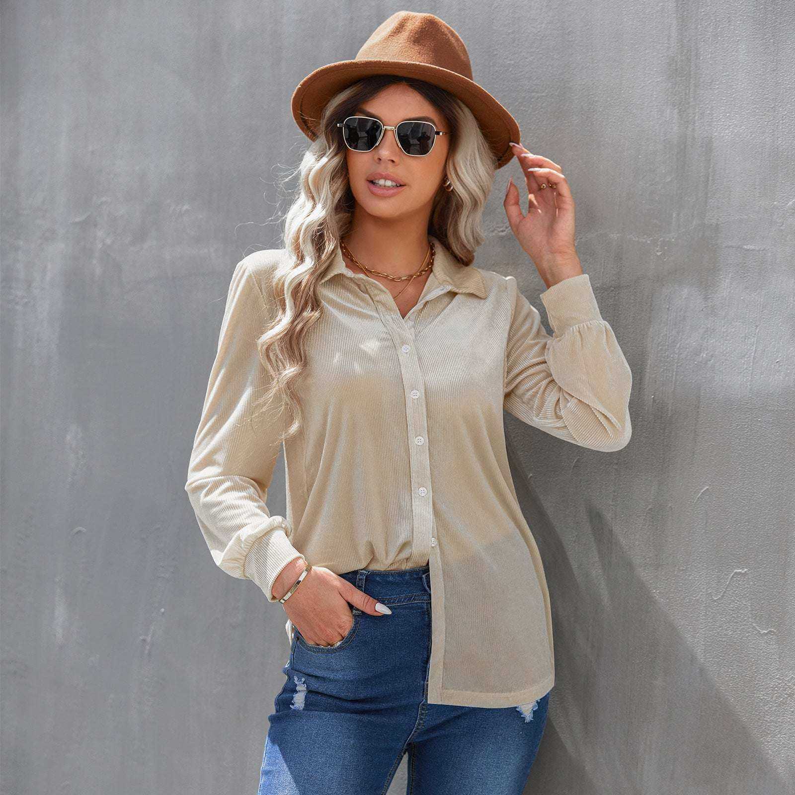 Ladies fashion velvet striped shirt in beige with long sleeves and lapel collar.