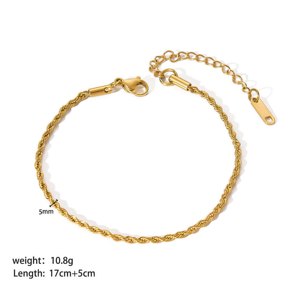 Stainless steel ornament bracelet with real gold PVDP finish, unisex design.