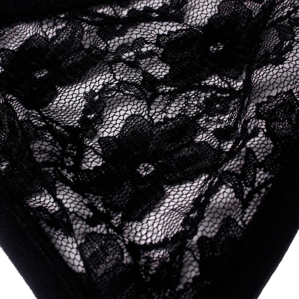 Close-up of black lace detailing on ladies lace bra underwear set.