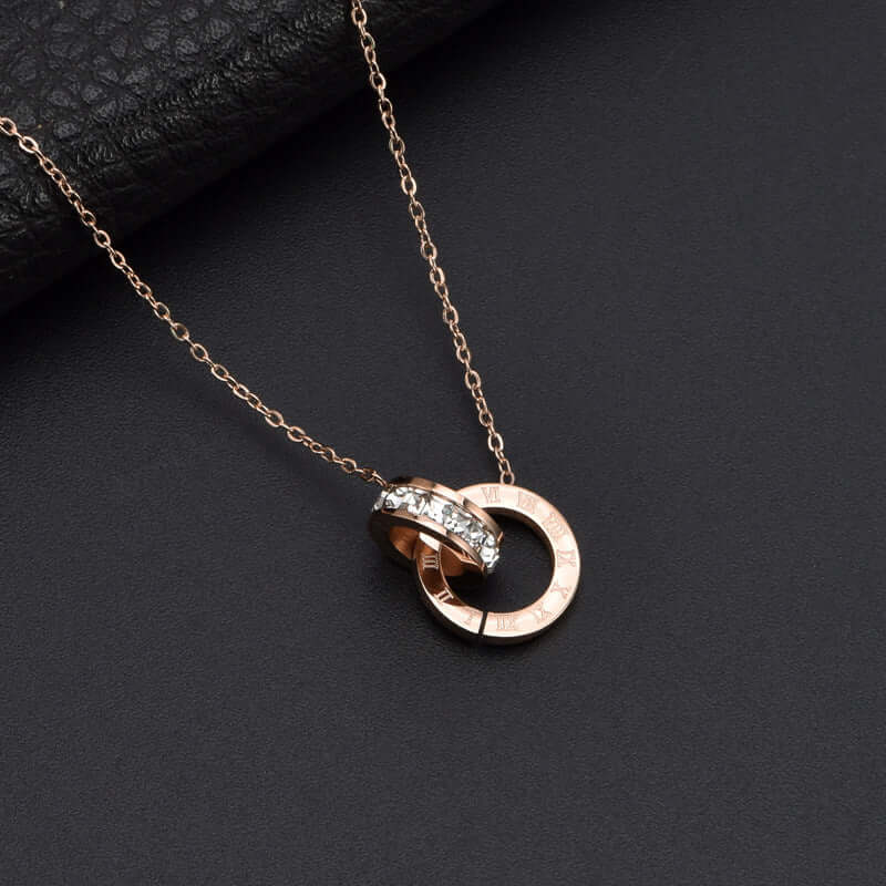 Roman numeral ring diamond titanium steel necklace for women in rose gold.