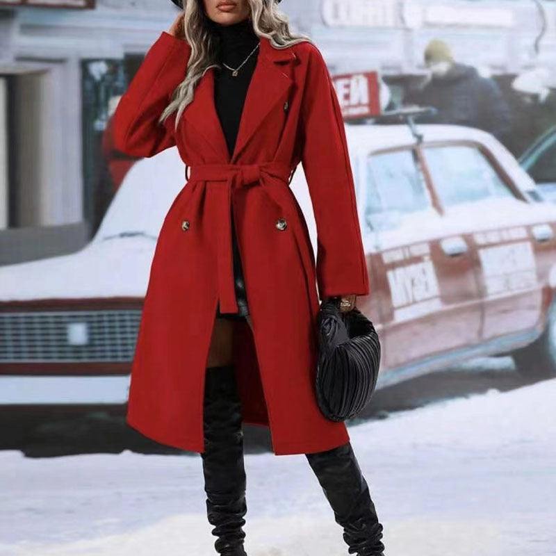 Women's red double-breasted trench coat with belt, stylish winter fashion long jacket.