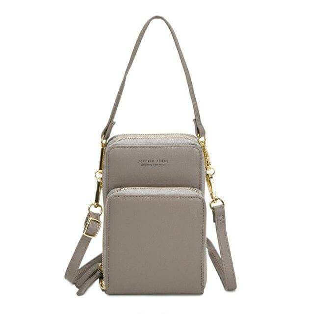 Mini crossbody shoulder bag for women in PU leather with touchable cell phone pocket and card slot.