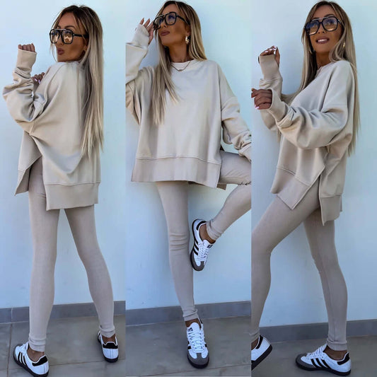 Women's casual loose long sleeve crew neck split top with tight trousers in beige.