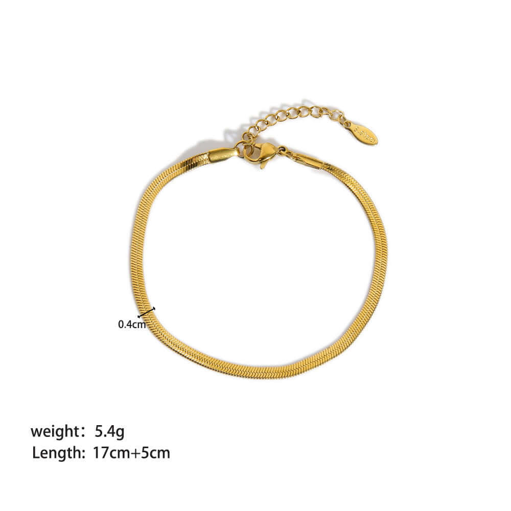 Stainless steel ornament bracelet for women with gold PVDP finish, 17cm length plus 5cm extension, shown on white background.