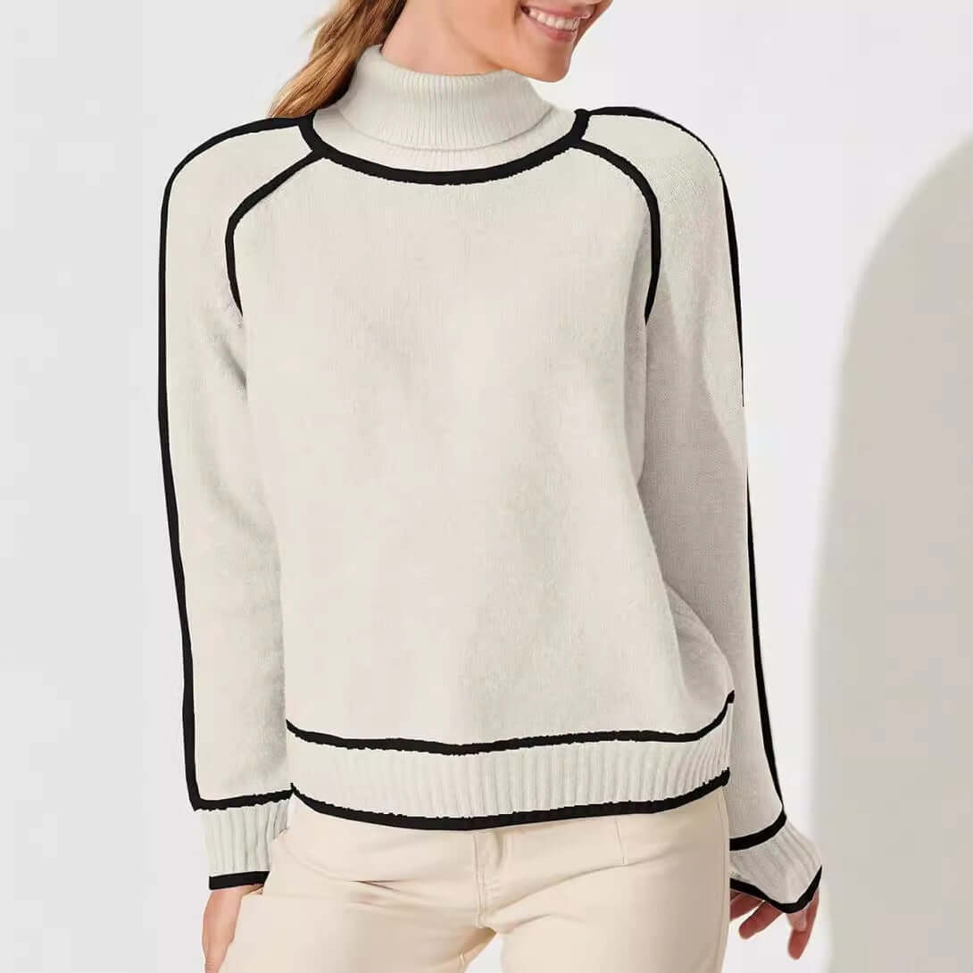 Stylish high-neck pullover sweater in cream with black trim, perfect for autumn and winter casual outfits.