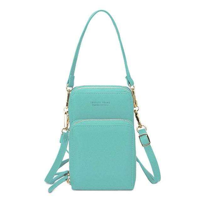 Mini crossbody shoulder bag for women, PU leather, touchable cell phone pocket, card purse in turquoise.