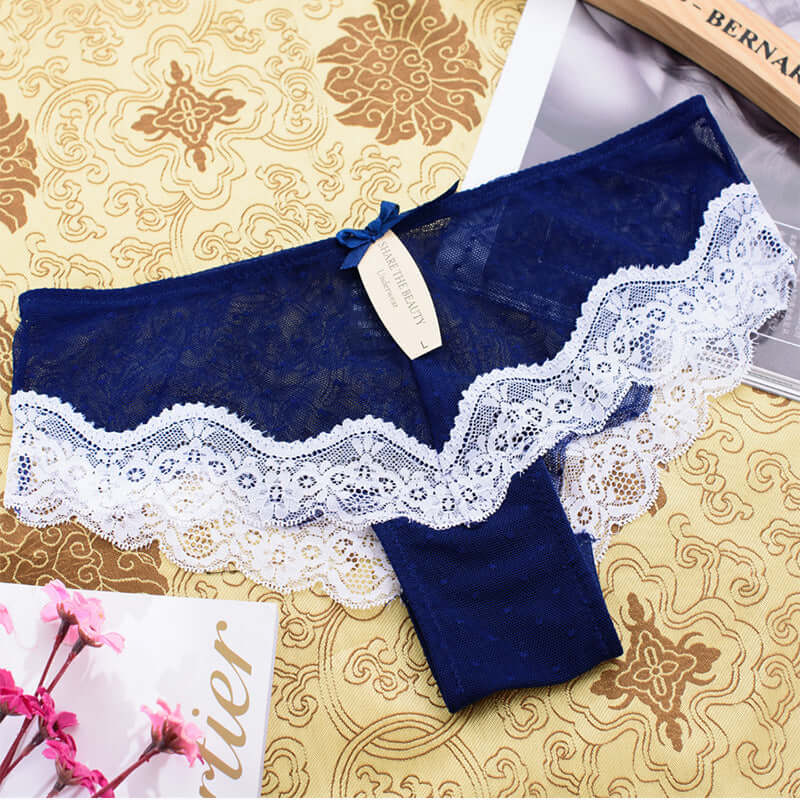 Sapphire blue knitted lace edge low waist ladies' mesh underwear with hollow design.