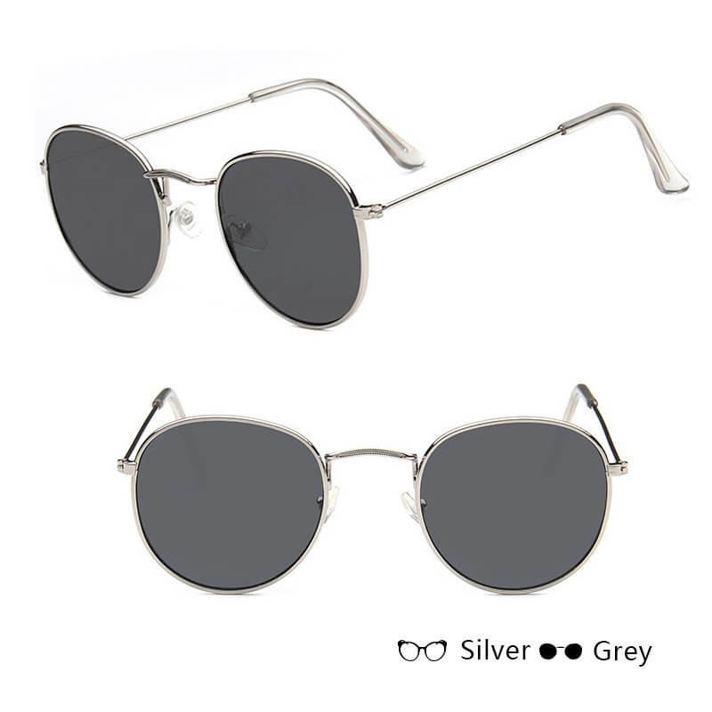 Round frame women retro sunglasses with silver metal frame and grey lenses.