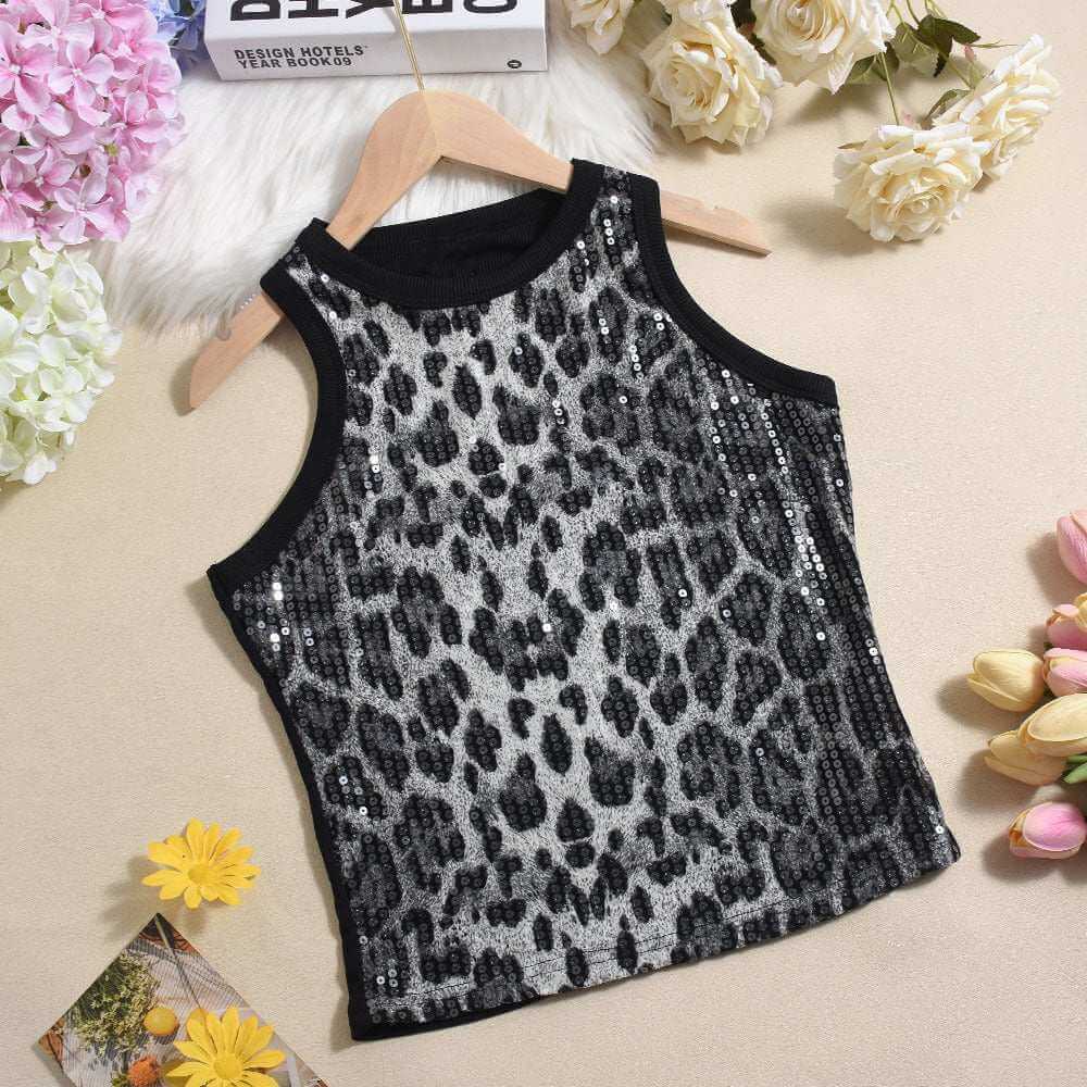 Cropped sleeveless sequin leopard print vest in black and gray on a beige background with flowers.