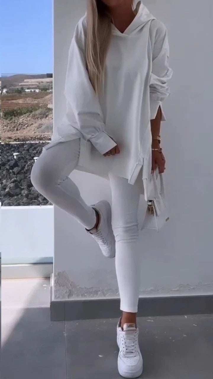 Women's white hooded sweatshirt and tights two-piece set, European street fashion style.