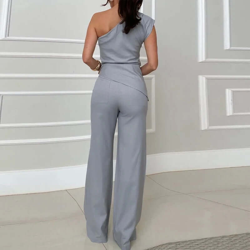 Gray sleeveless top and high waist slim pants set with diagonal collar, elegant style.