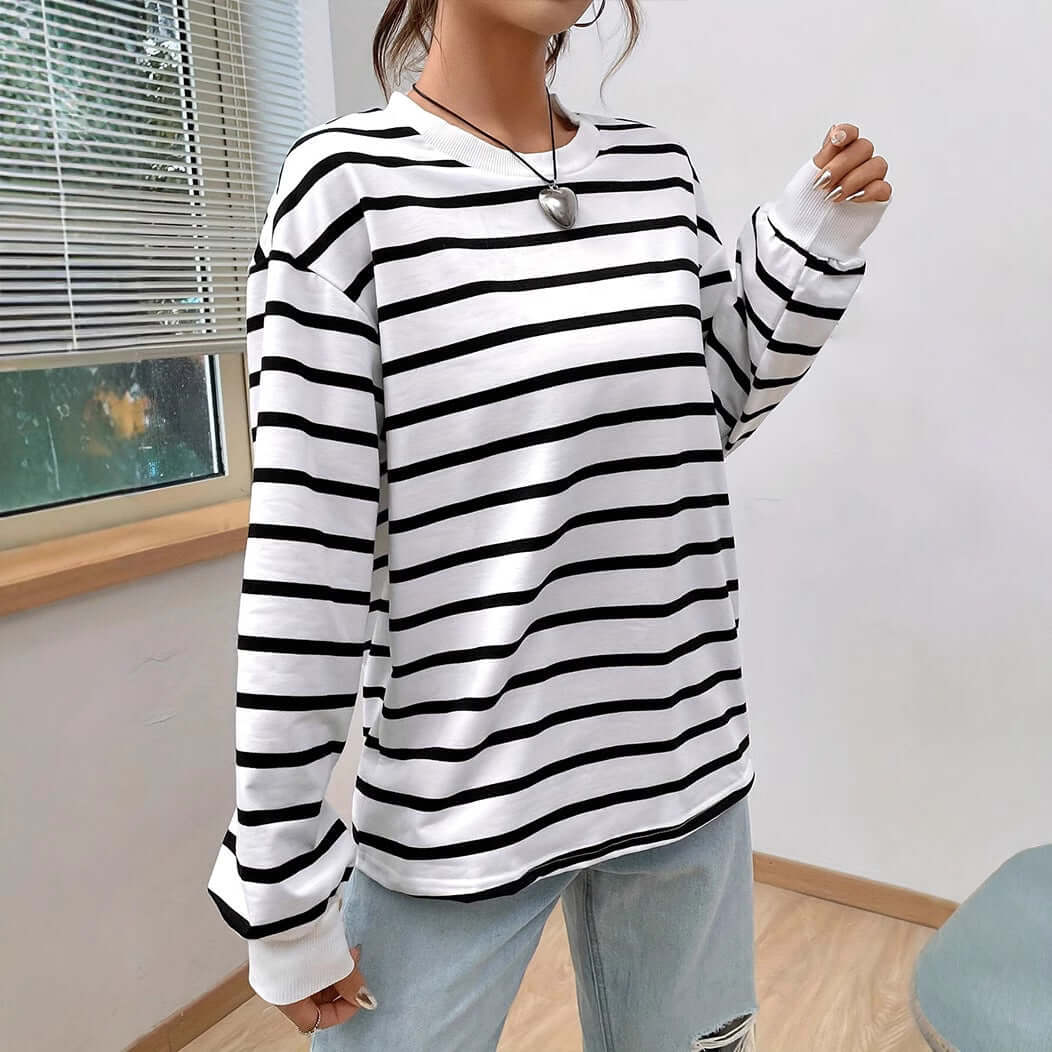 Women's vintage striped long-sleeved T-shirt in white.