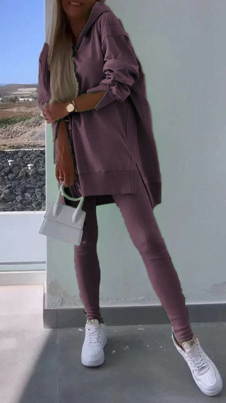 Women's hooded sweatshirt tights set in purple, European style fashion outfit.