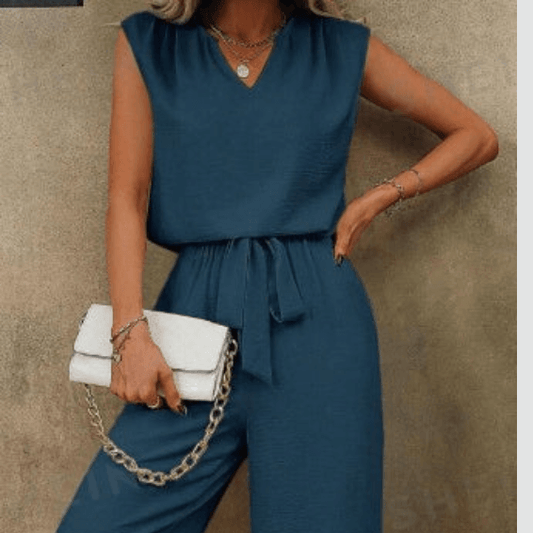 Women sleeveless top and belted long pants set with notch neckline in solid color.