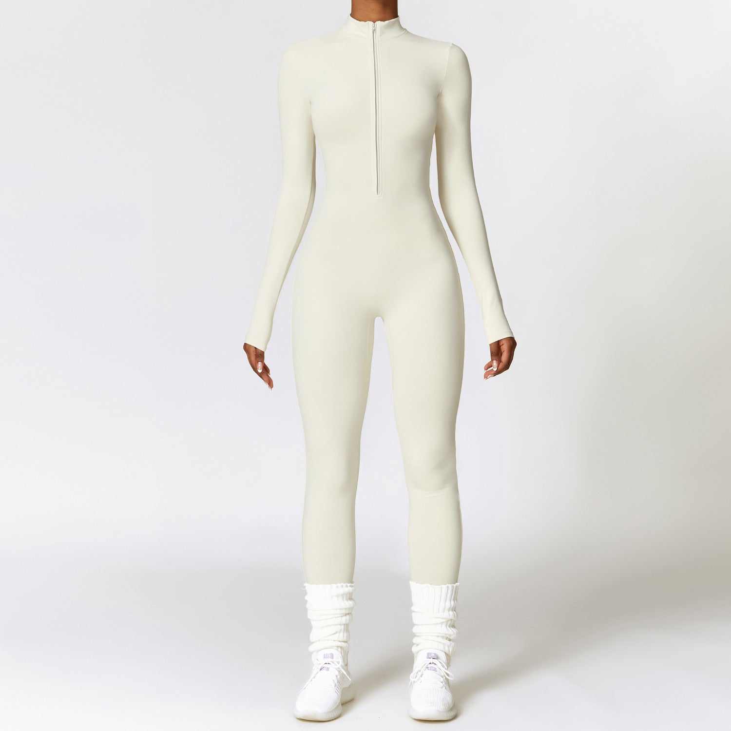 Women’s warm zipper long-sleeved jumpsuit yoga fitness bodysuit in cream apricot.