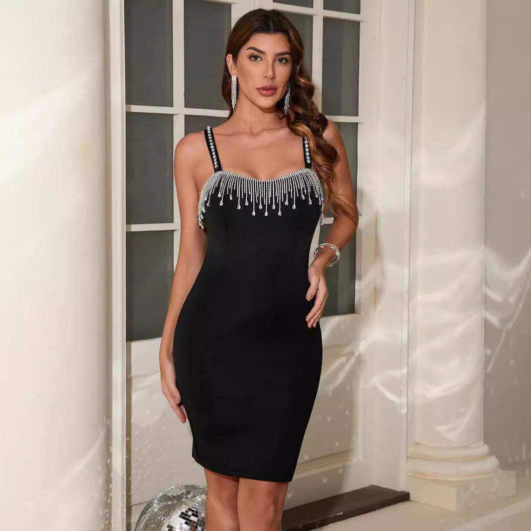 Black tassel tea dress with diamond decorations, sling style and high waist, mid-length.