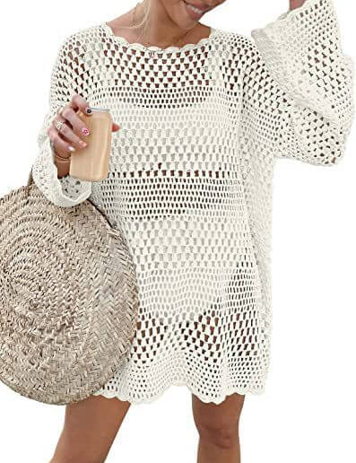 Woven round neck hollow beach cover-up sweater in white with bell sleeves.