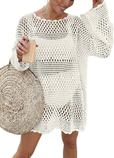 Woven round neck hollow beach cover-up sweater in white with bell sleeves.