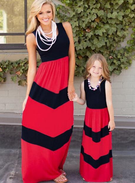 Women's parent-child sleeveless dresses in red and black with large swing skirts.