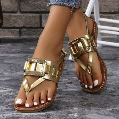 Plus size flip-toe sandals for women in gold, featuring T-shaped buckle design with low-top artificial PU upper and rubber sole.