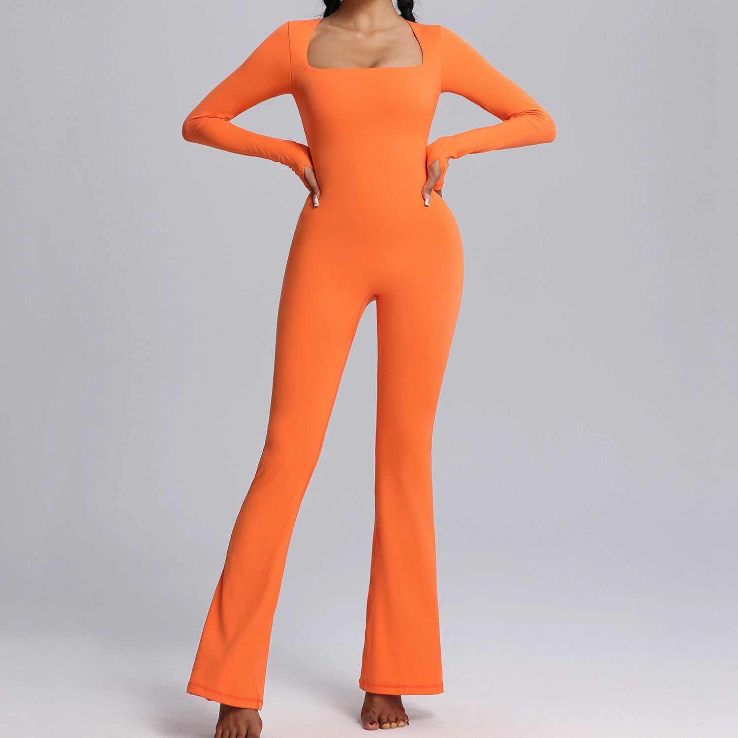 Vibrant orange square neck long-sleeved jumpsuit with flared pants for yoga and fitness, breathable women's bodysuit.