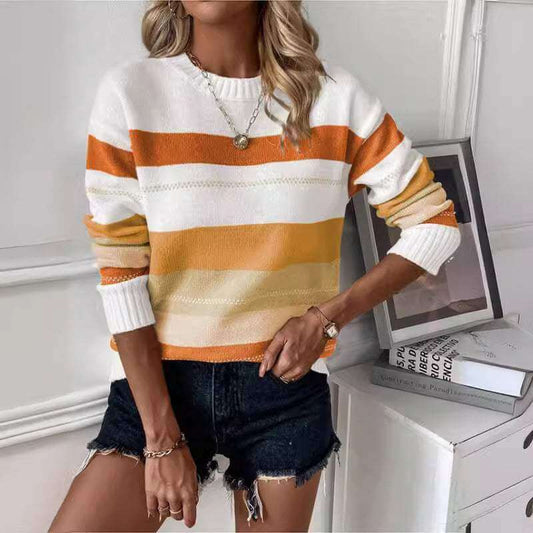 Casual contrast color striped knitted long sleeve sweater in orange and white, women's pullover style.